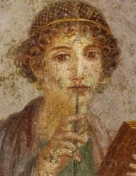 ancient roman art of a woman with a stylus