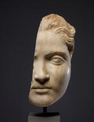 fragment of a face sculpture