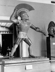 An eight foot forgery Etruscan statue