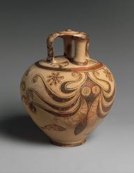 An ancient amphora with a depiction of an octopus on it.