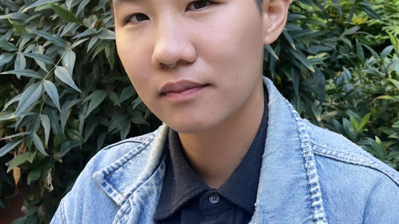 A photo of Dr. Erin Lam wearing a denim shirt.