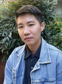 A photo of Dr. Erin Lam wearing a denim shirt.