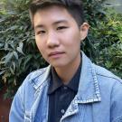 A photo of Dr. Erin Lam wearing a denim shirt.